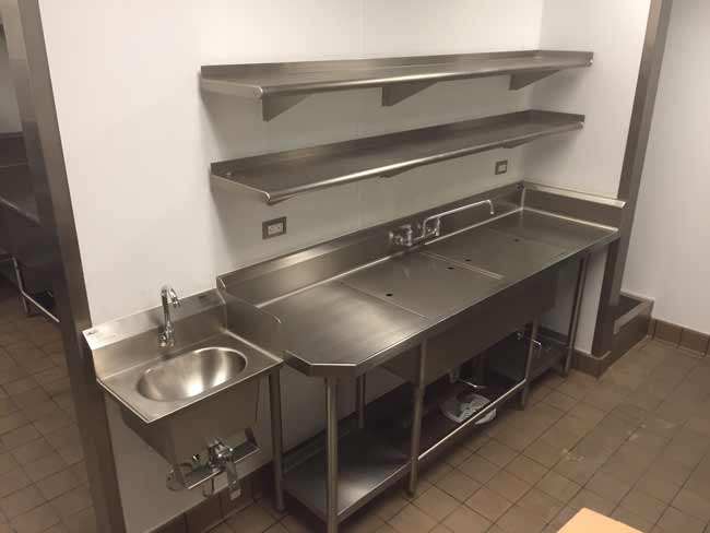Clean 2 compartment prep sink with sink covers, holders, wall shelves
