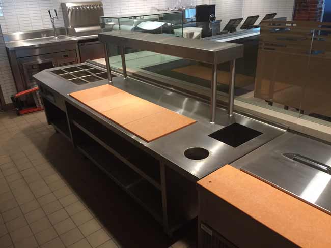 Stainless steel work counter with remote pan chiller assembly