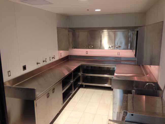 Wrap around stainless steel cabinets and countertops welded in place