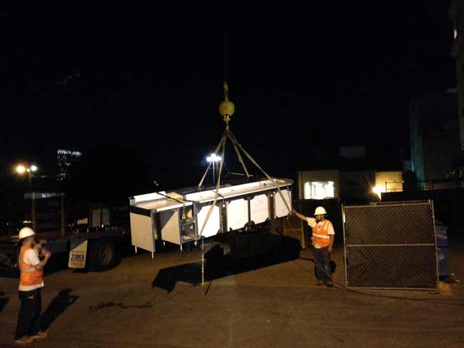 Beverage Counter on It's Way to the Roof Via Crane